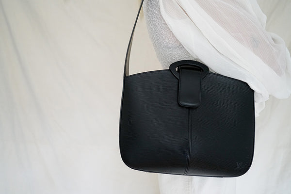 Louis Vuitton Black Epi Leather Reverie Bag For Sale at 1stDibs  louis  vuitton reverie bag, louis vuitton epi reverie, louis vuitton motorcycle  seat