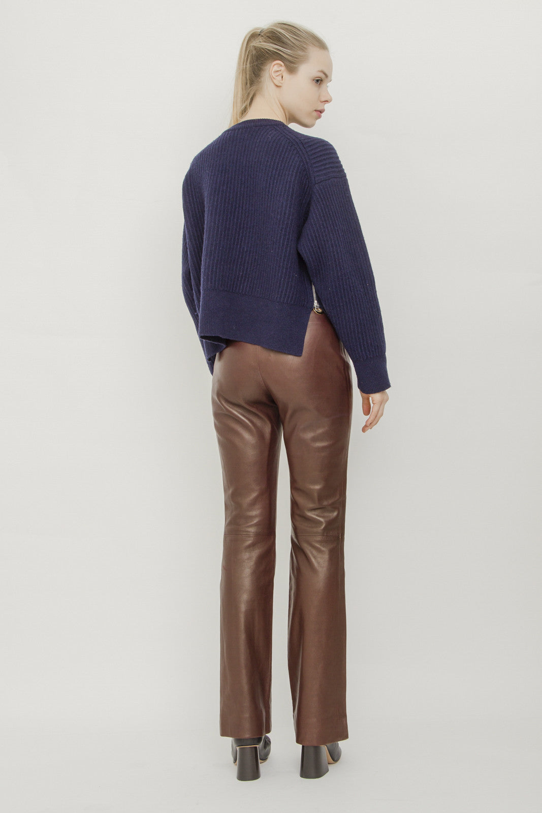 LEATHER GROMMET PANTS