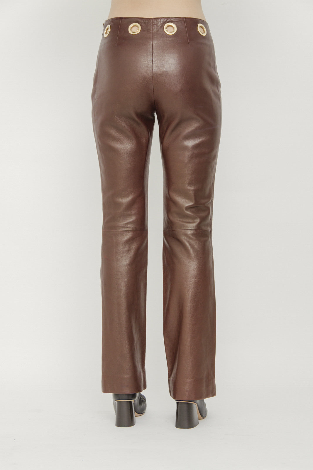 LEATHER GROMMET PANTS