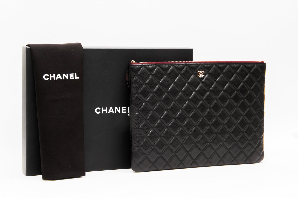 QUILTED CLUTCH WITH TAGS