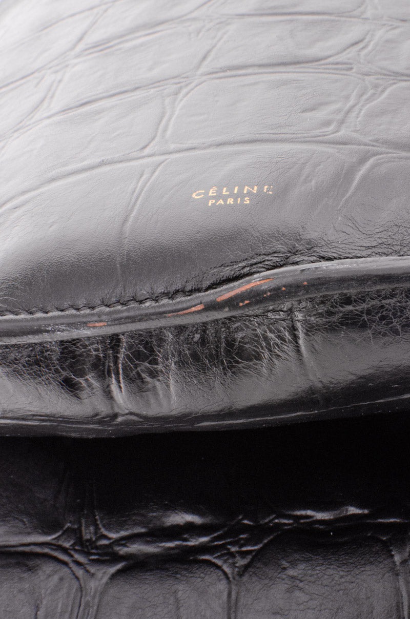 EMBOSSED CURVED SHOULDER BAG