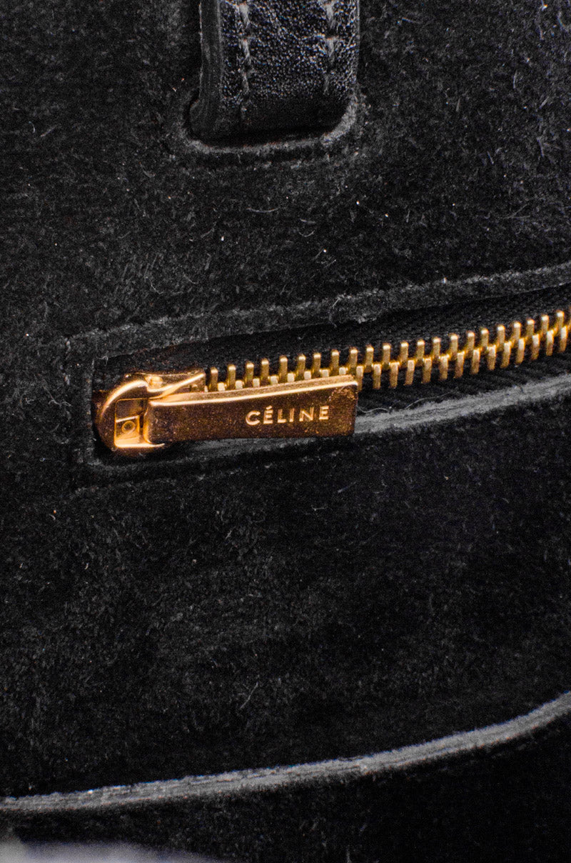 EMBOSSED CURVED SHOULDER BAG