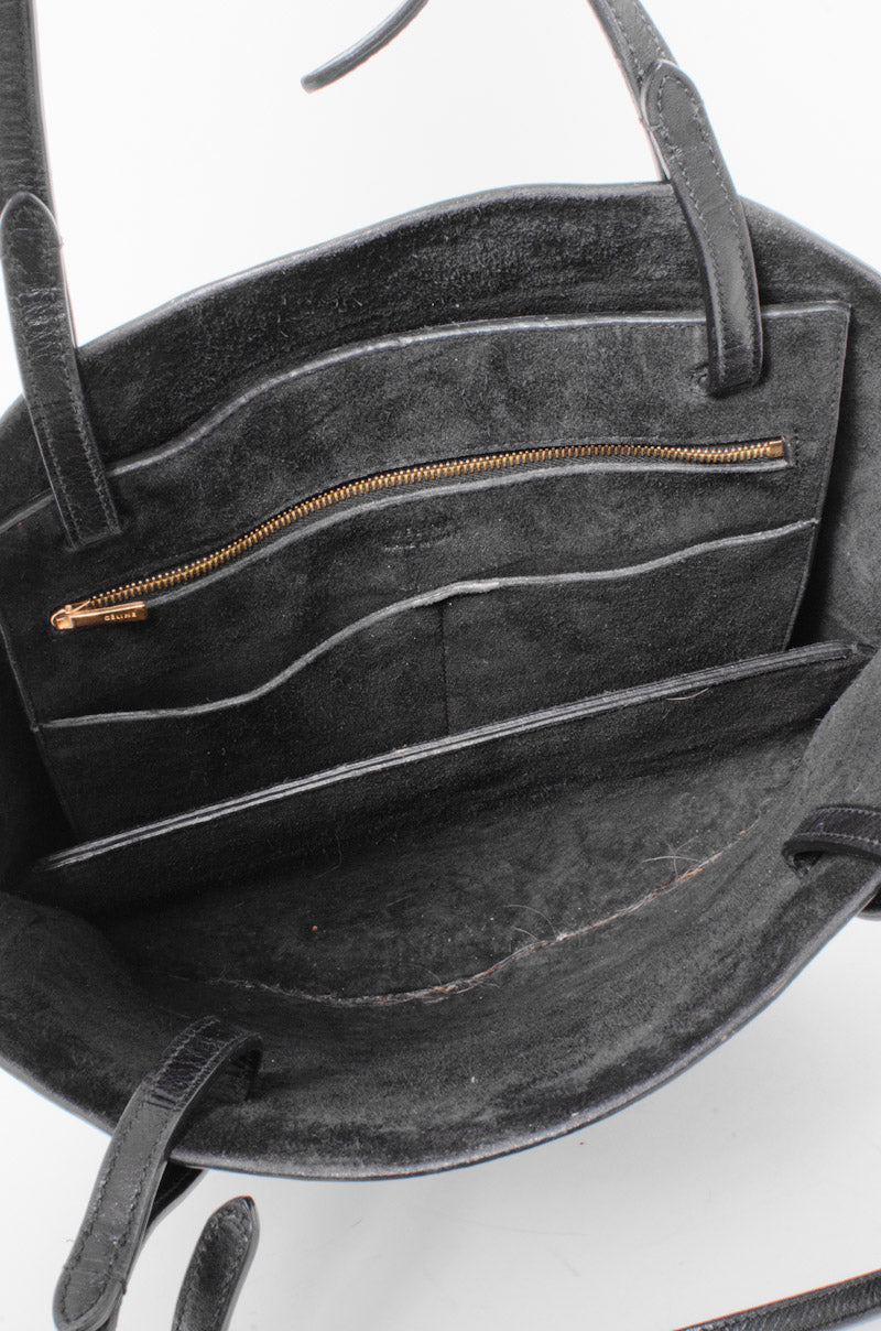 EMBOSSED CURVED SHOULDER BAG