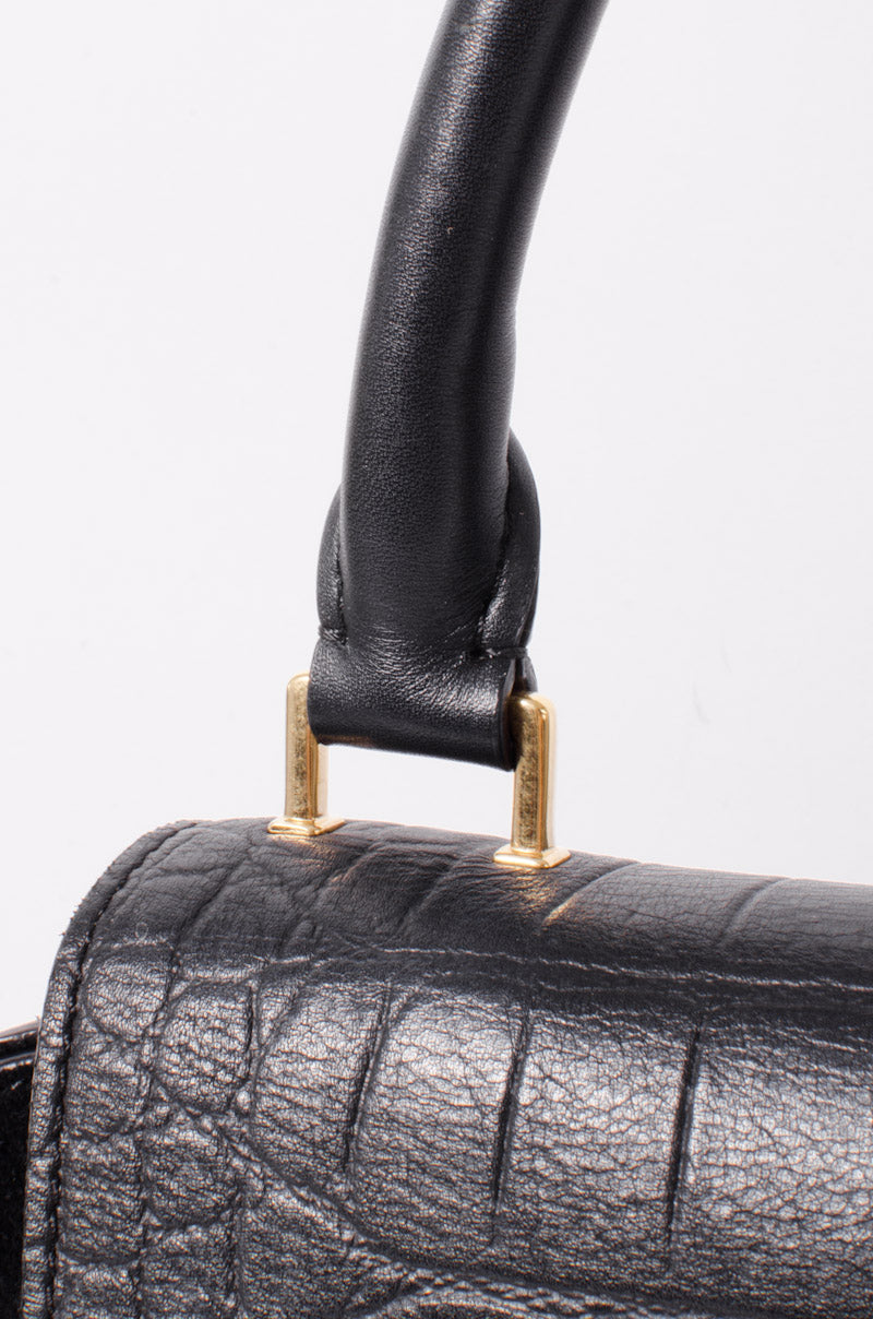 EMBOSSED TRAPEZE BAG