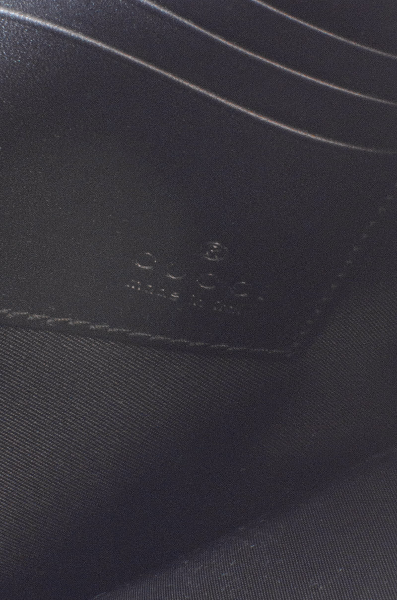 CALEIDO MONOGRAM CLUTCH