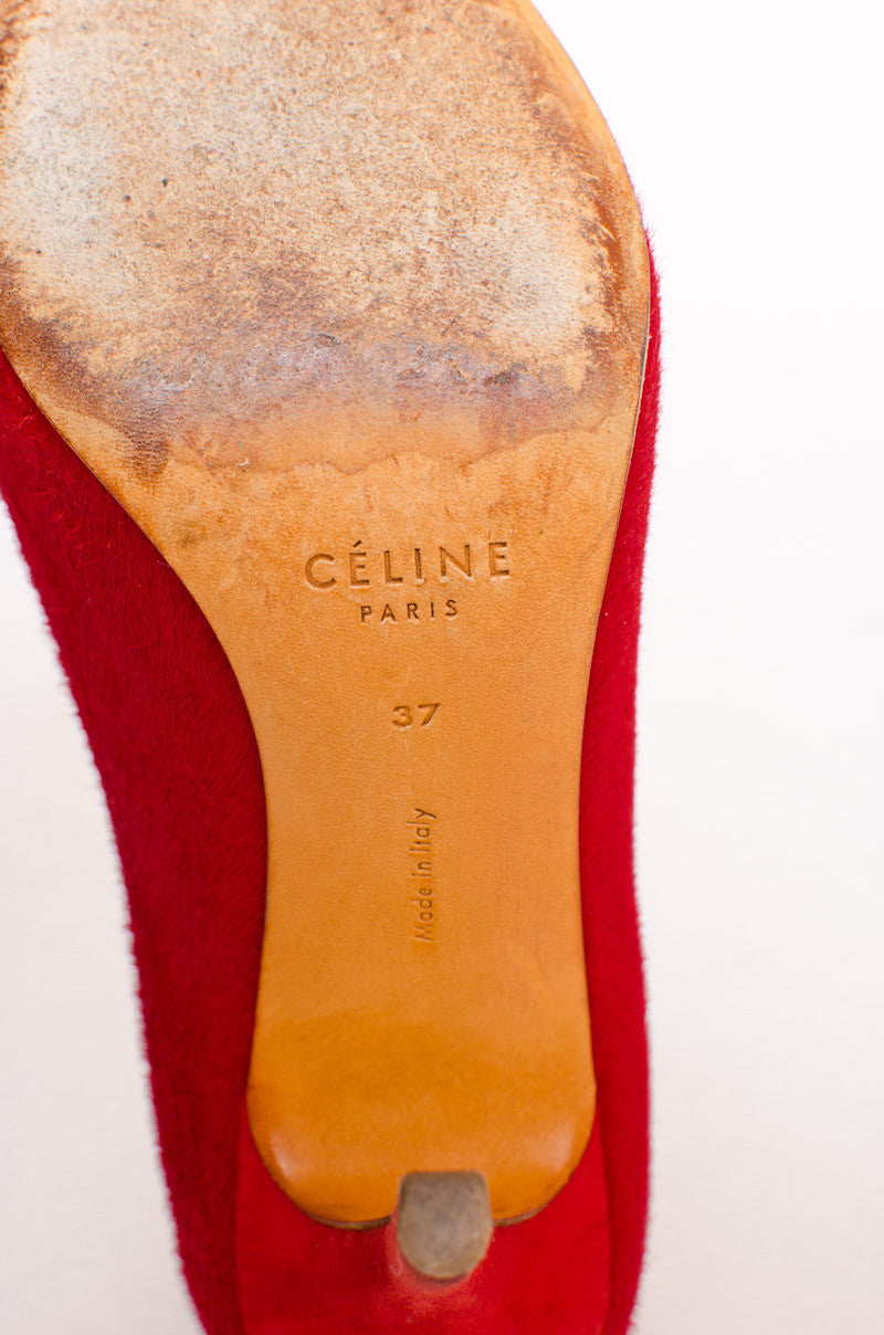 RED PONYHAIR PUMPS