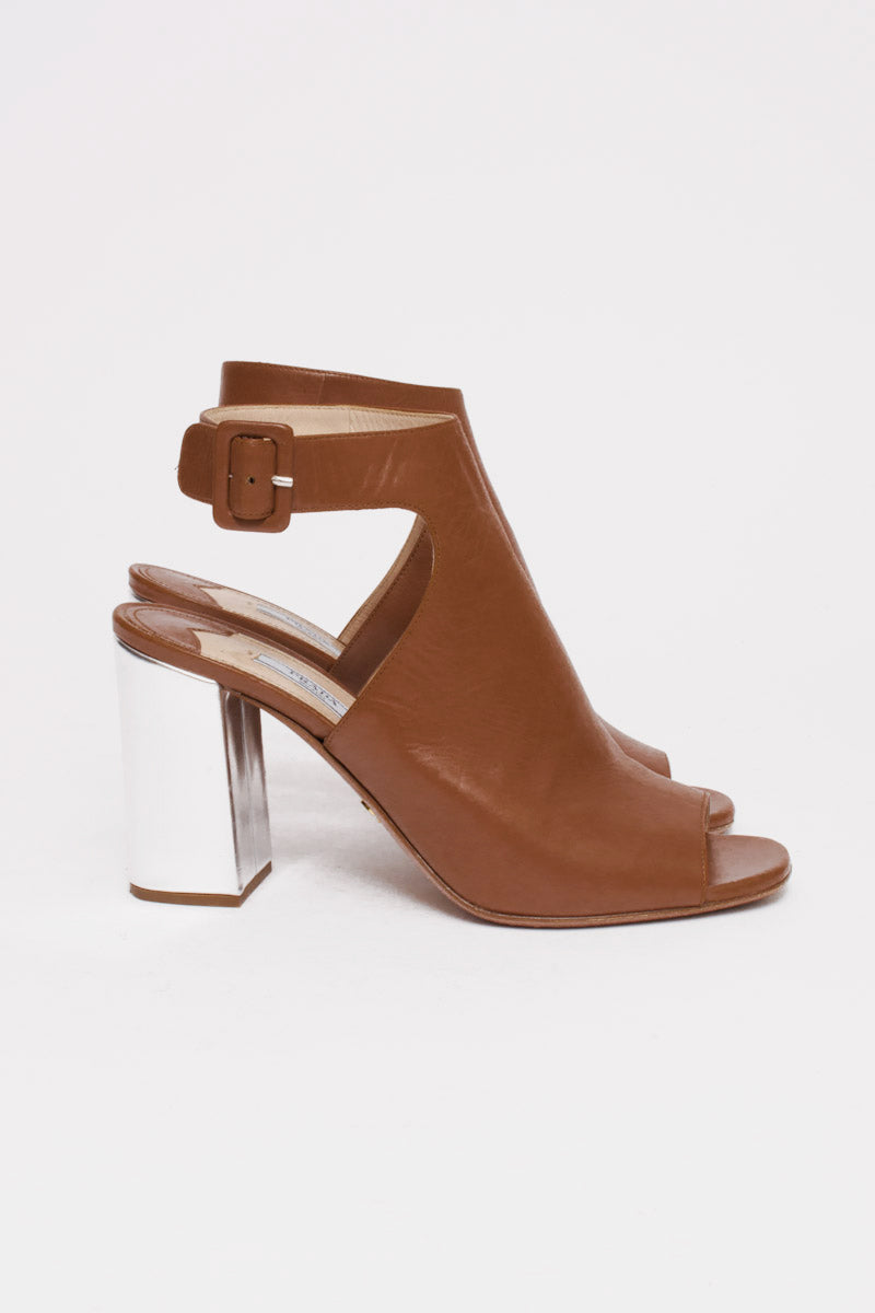 SILVER HEEL PUMPS