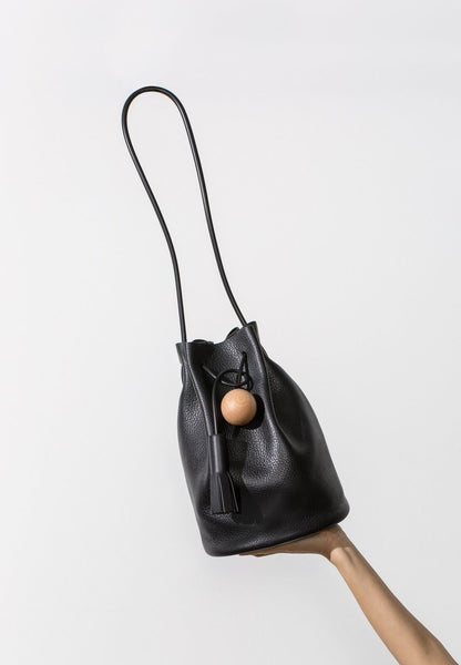 BUILDING BLOCK Black Leather Wood Ball Circle Tassel Bucket Shoulder Bag Purse