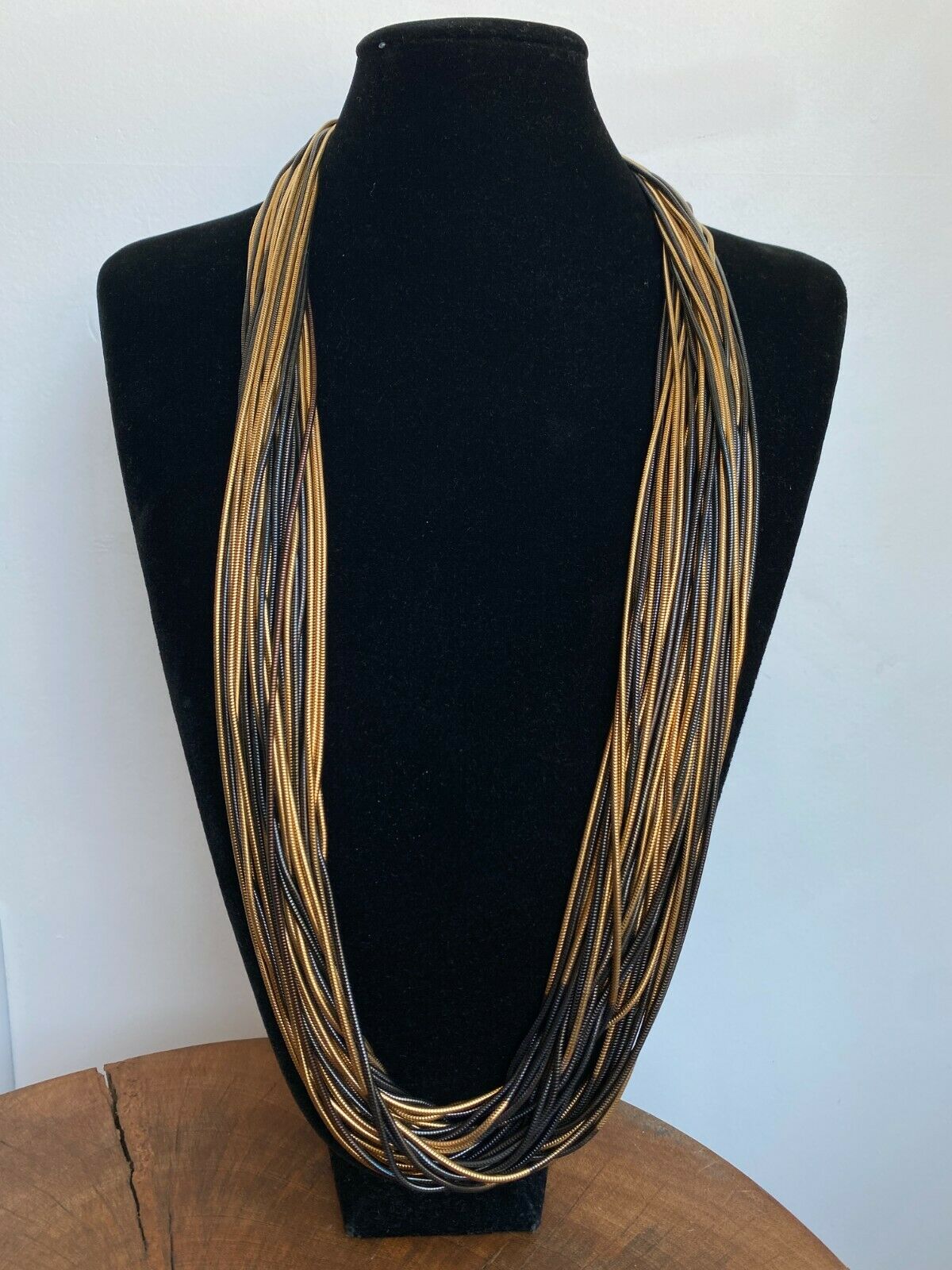 MULTI STRAND NECKLACE