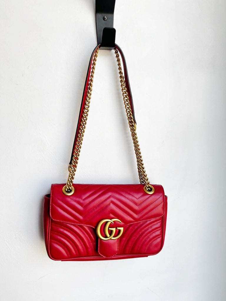 GG Marmont matelassé small shoulder bag in red leather