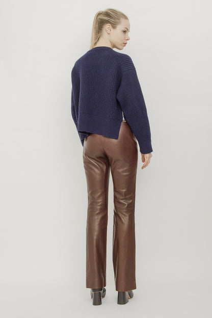 LEATHER GROMMET PANTS