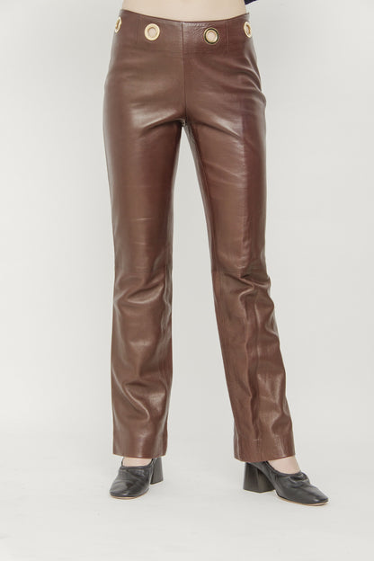 LEATHER GROMMET PANTS