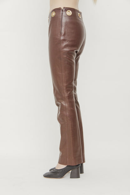 LEATHER GROMMET PANTS