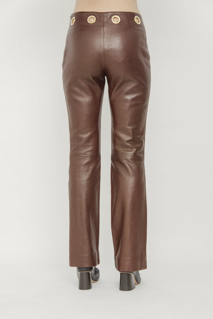 LEATHER GROMMET PANTS