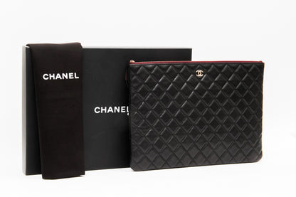 QUILTED CLUTCH WITH TAGS