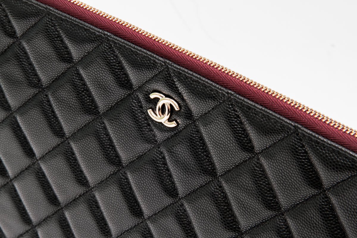 QUILTED CLUTCH WITH TAGS