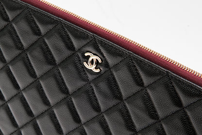 QUILTED CLUTCH WITH TAGS
