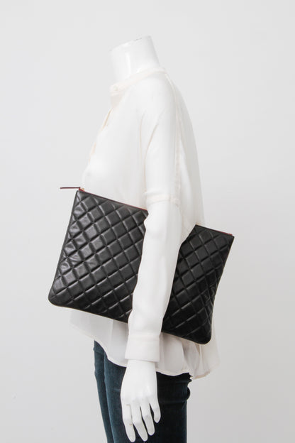 QUILTED CLUTCH WITH TAGS