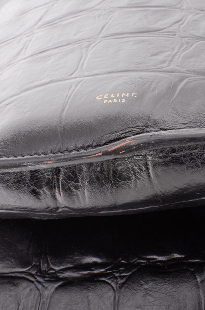 EMBOSSED CURVED SHOULDER BAG