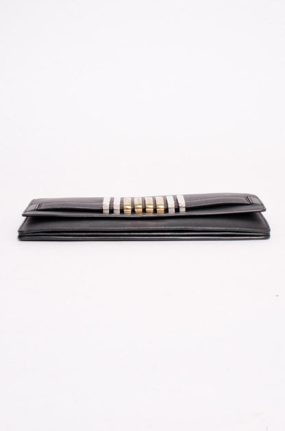 METAL EMBELLISHED CLUTCH
