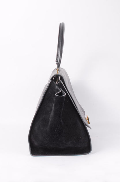 EMBOSSED TRAPEZE BAG