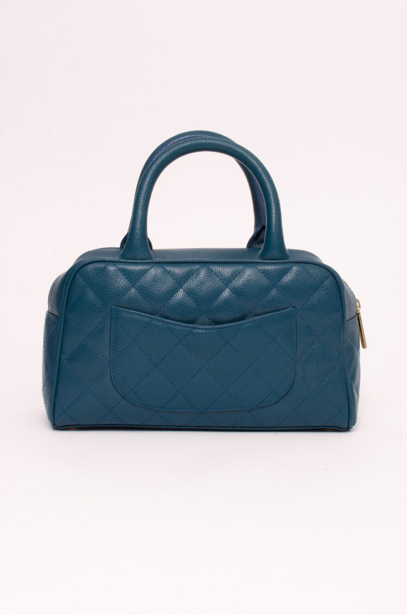 TURQUOISE BOWLER BAG