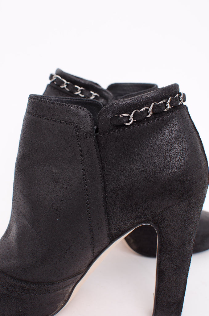 WAXED BLACK ANKLE BOOTIES