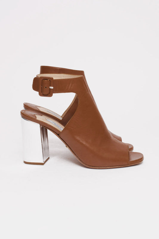 SILVER HEEL PUMPS