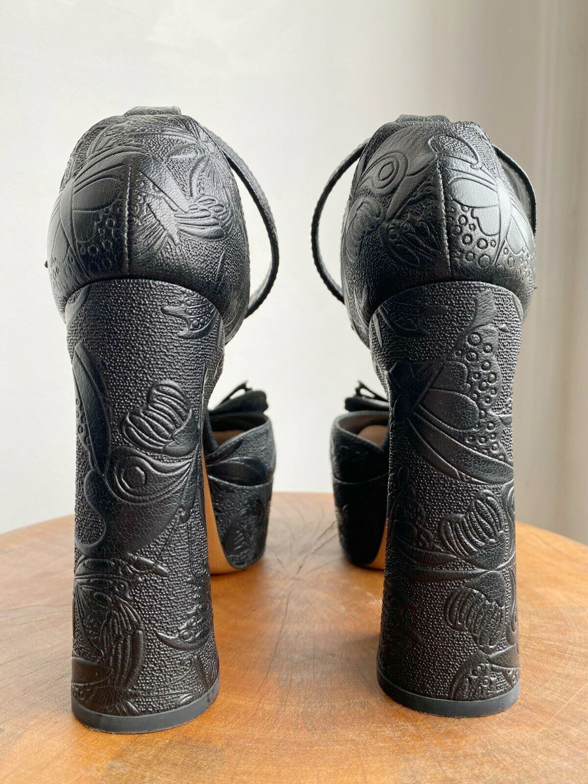 BUTTERFLY EMBOSSED PLATFORMS
